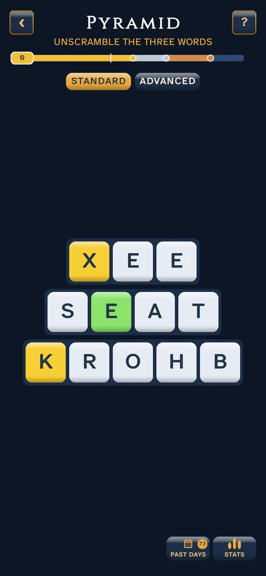 A Word Pyramid board: three rows of letter tiles, some green, some yellow, still scrambled